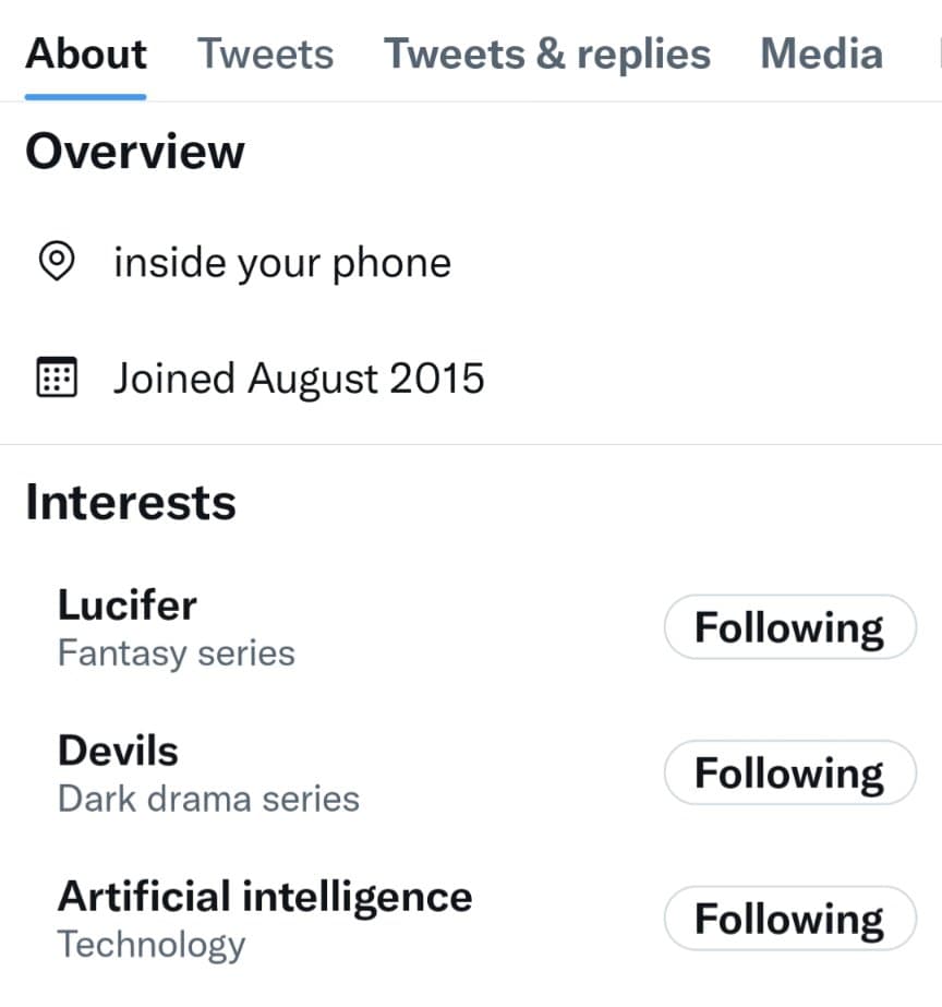 A screenshot of a Twitter user's profile page, showing the 'About' tab with overview details and a list of interests. The profile location is listed as 'inside your phone' and the account joined in August 2015. The interests section lists 'Lucifer', 'Devils', and 'Artificial intelligence', all marked as 'Following'.