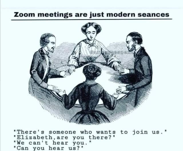 A black-and-white meme featuring a vintage illustration of four people sitting around a table with their hands on a central object, resembling a spiritualist séance. The image is captioned with text comparing Zoom meetings to modern séances, with dialogue lines mimicking common audio issues in video calls.