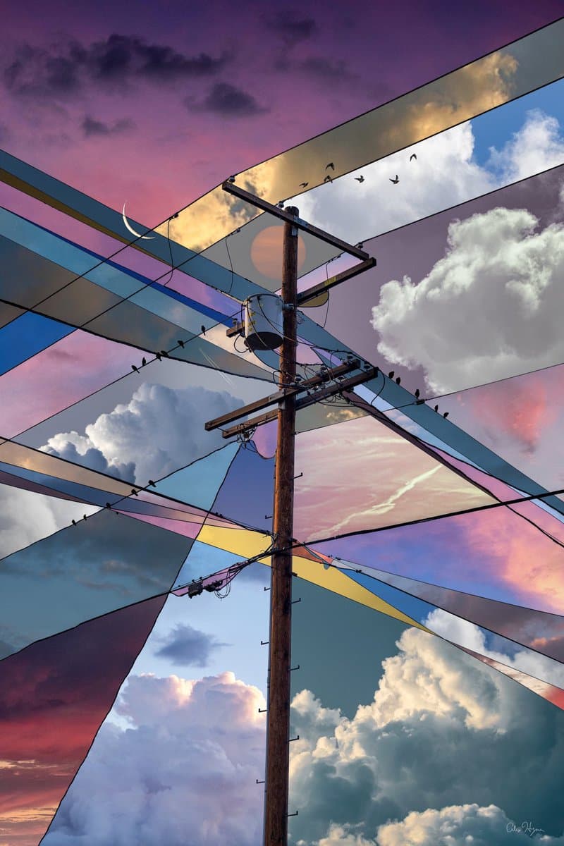 A digital art piece featuring a central wooden utility pole surrounded by a web of intersecting, semi-transparent panels that reflect different times of day, from sunset to night. The composition creates a kaleidoscopic effect against a cloudy sky, with a small signature visible in the bottom right corner.