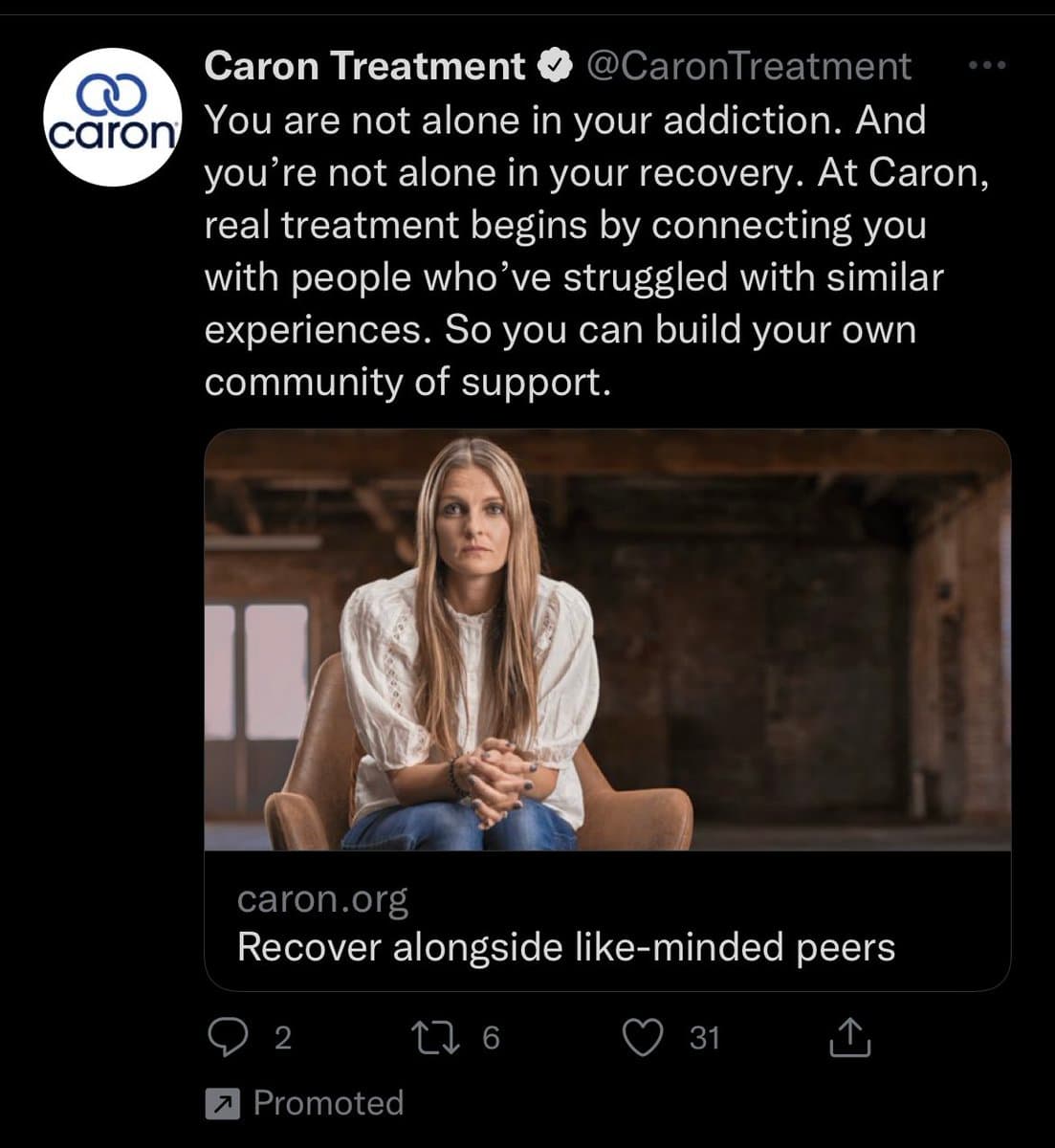 A screenshot of a promoted tweet from the verified account @CaronTreatment, which features a photo of a woman sitting in a chair. The tweet text discusses addiction and recovery, and the image includes a link to caron.org with the caption 'Recover alongside like-minded peers.'