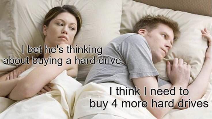 A meme featuring a couple lying in bed, facing away from each other with serious expressions. Text overlays are placed near each person to convey a dialogue about purchasing computer hardware.