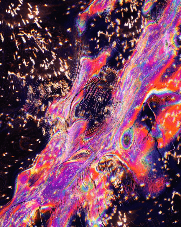 An abstract digital image featuring vibrant, iridescent swirls of pink, purple, and orange against a dark background with scattered white specks. The composition has a fluid, glitch-art aesthetic with no legible text.