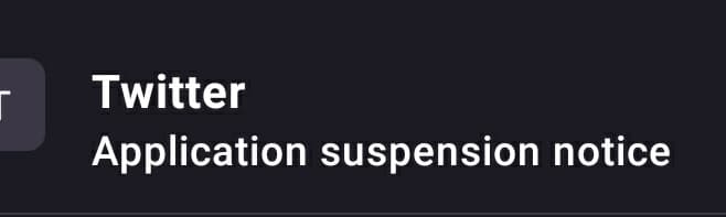 A screenshot of a Twitter notification banner with a dark background. The text reads "Twitter" in bold, followed by "Application suspension notice" below it.