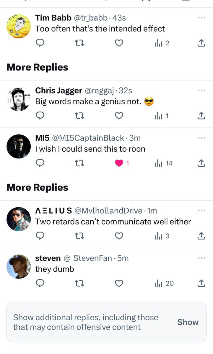 A screenshot of a Twitter conversation thread showing several replies to a post. The replies include comments from users Tim Babb, Chris Jagger, MI5, AELIUS, and steven, with one reply containing a slur. A button at the bottom offers to show additional replies that may contain offensive content.