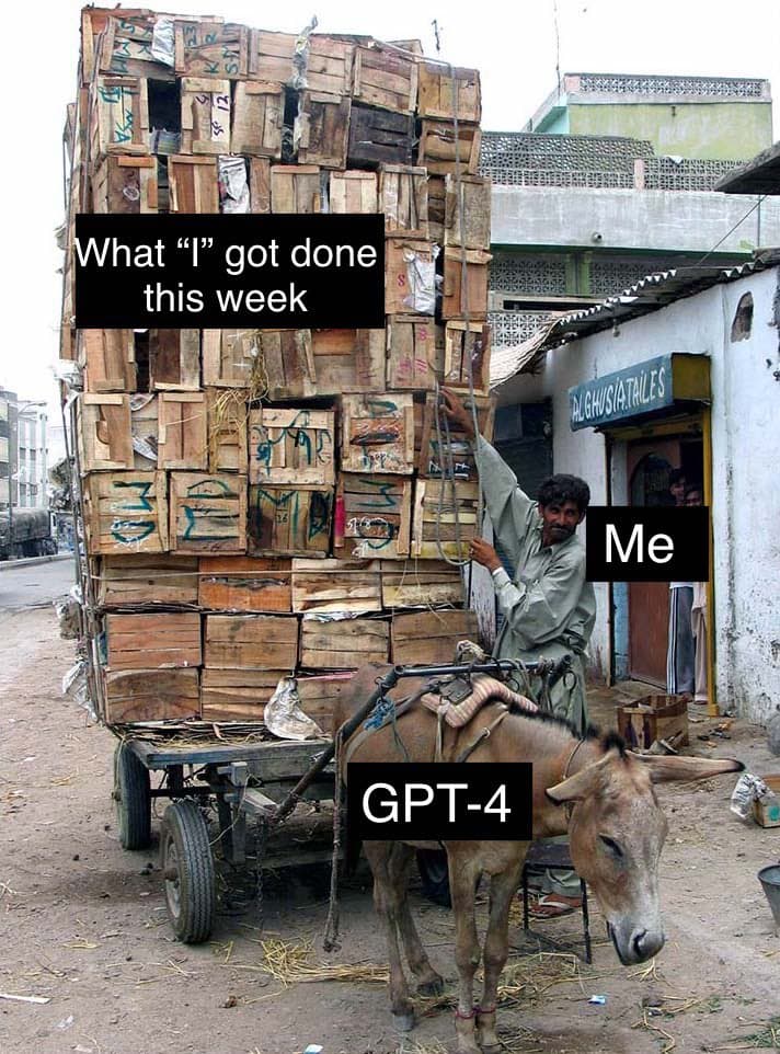 A meme featuring a photograph of a man standing next to a donkey pulling a cart stacked impossibly high with wooden crates. The image uses text overlays to make a humorous comparison about productivity.