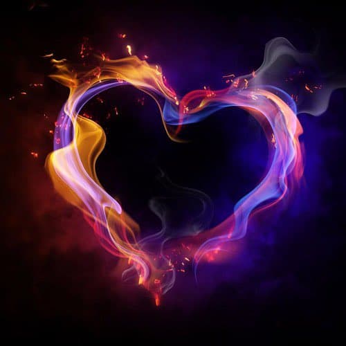 A digital artwork depicting a heart shape formed by swirling, colorful smoke and embers against a dark background. The smoke features vibrant hues of orange, yellow, purple, and blue, with small sparks rising from the top of the heart.