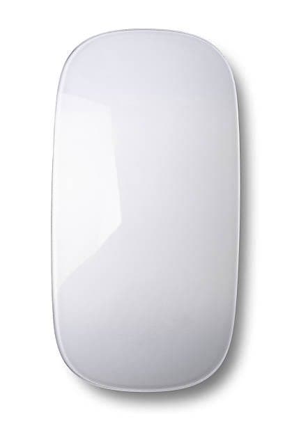 A top-down view of a white, oval-shaped computer mouse with a smooth, glossy surface and no visible buttons or markings. The mouse is centered on a plain white background with a soft shadow beneath it.
