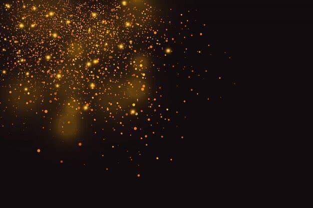 A digital graphic featuring a burst of golden and orange bokeh light particles against a black background, resembling a celebratory sparkler or confetti effect. The image is used as a birthday greeting.