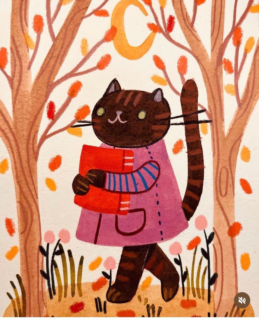 A whimsical illustration of a brown tabby cat standing upright in a forest, wearing a pink coat and blue striped scarf while holding a red book. The background features stylized trees with orange leaves and a yellow crescent moon.