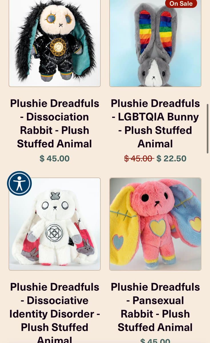 A screenshot of an online store page displaying four plush rabbit toys, each labeled with a specific identity or diagnosis. The products include a 'Dissociation Rabbit', an 'LGBTQIA Bunny', a 'Dissociative Identity Disorder' rabbit, and a 'Pansexual Rabbit'.