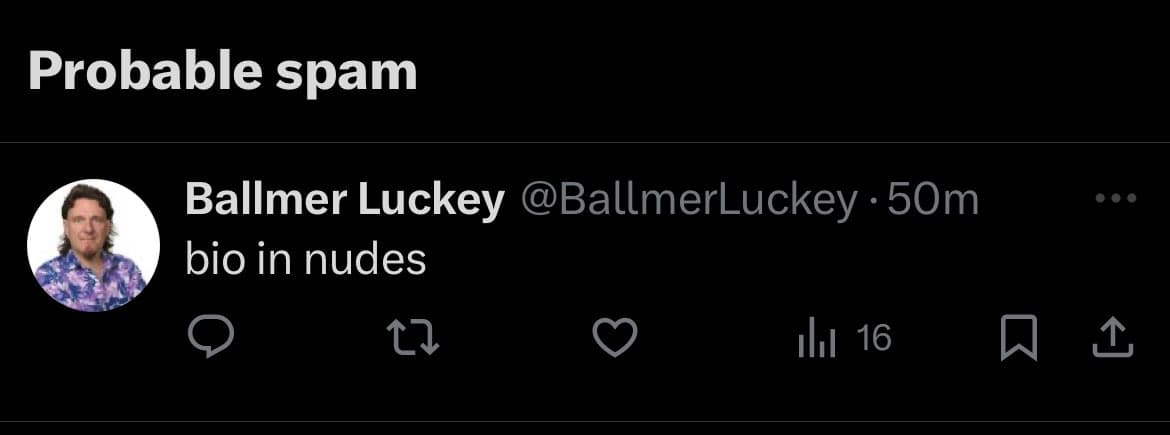 A screenshot of a Twitter post flagged as 'Probable spam' by the platform. The tweet is from user 'Ballmer Luckey' (@BallmerLuckey) and contains the text 'bio in nudes'.
