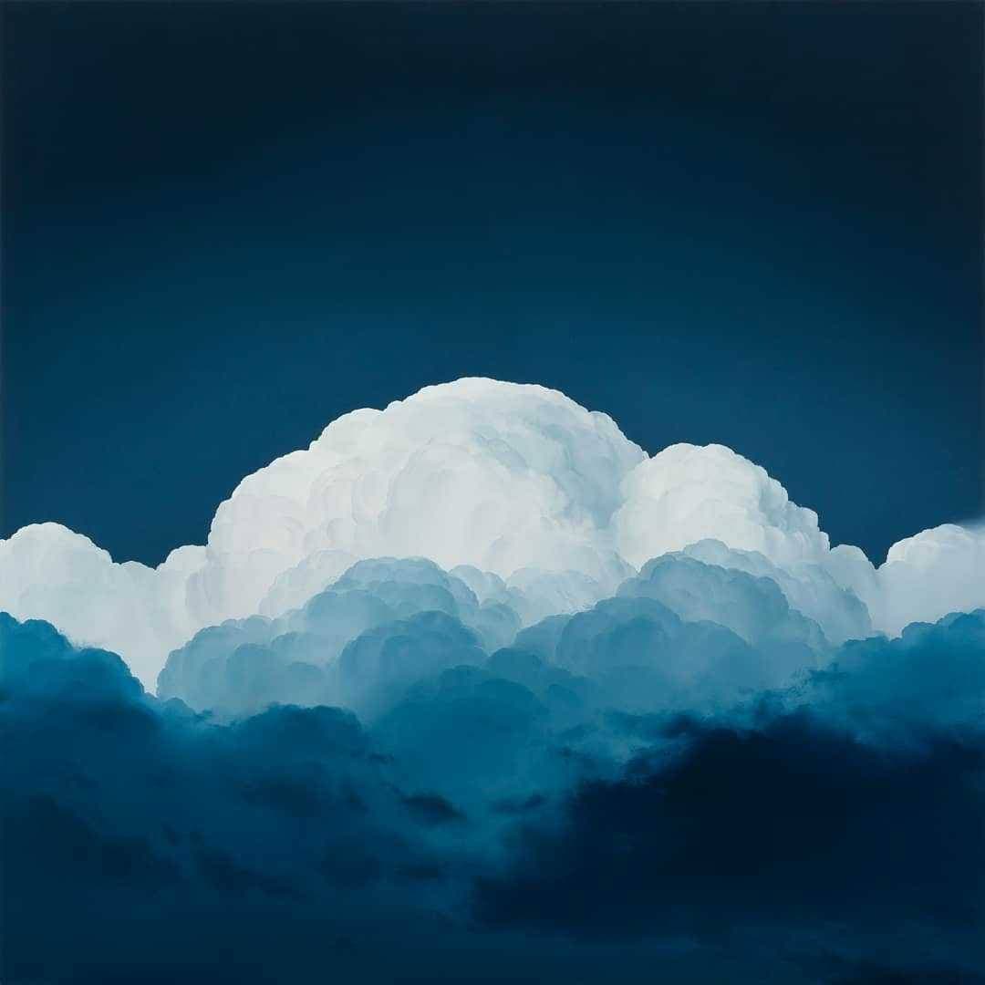 A digital painting of a large, billowing white cumulus cloud set against a deep blue sky, with darker blue clouds in the foreground.