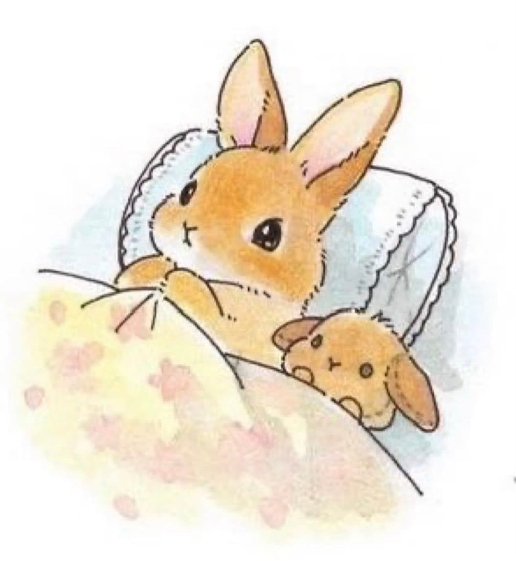 A watercolor illustration of a cute, light-brown rabbit lying in bed with a smaller rabbit beside it. The larger rabbit is propped up on a white pillow with a scalloped edge, while the smaller one peeks out from under a yellow blanket patterned with pink flowers.