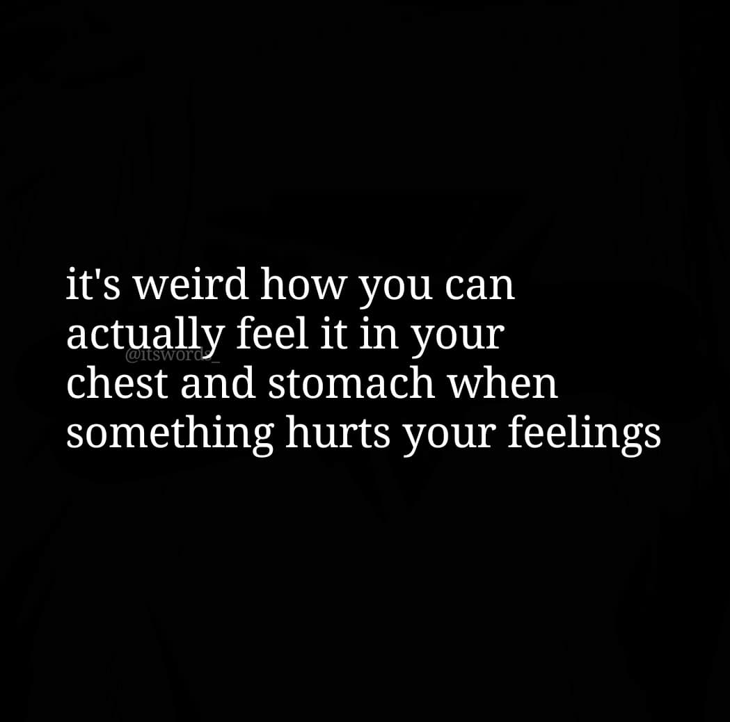 A black square image with white text centered on it, expressing a personal reflection on the physical sensation of emotional pain. A small watermark is visible in the middle of the text.