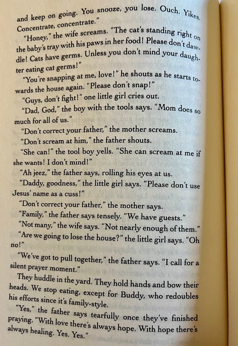 A close-up photograph of an open book page showing a passage of dialogue from a novel. The text depicts a family argument and a moment of reconciliation, ending with the quote: "With love there's always hope. With hope there's always healing."