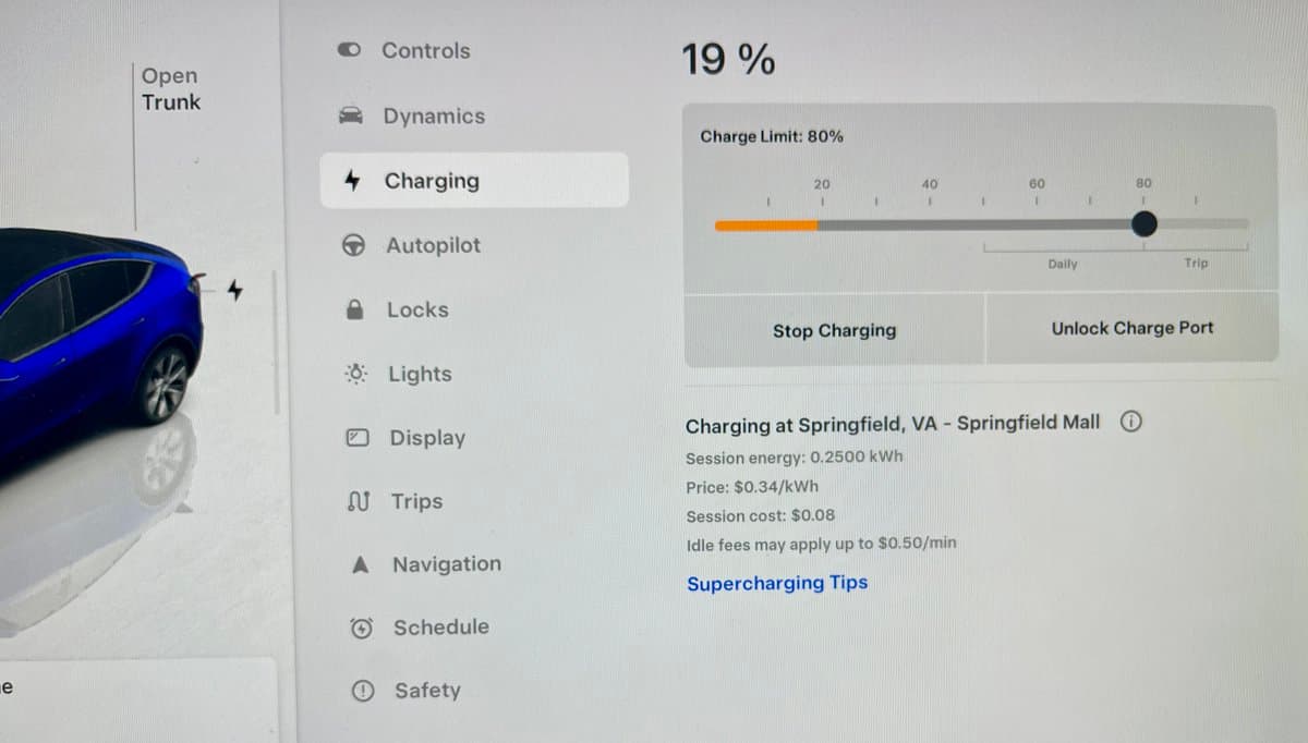 A photo of a Tesla vehicle's touchscreen interface displaying the Charging settings menu. The screen shows the car is at 19% charge with a limit of 80%, and is currently charging at a Supercharger in Springfield, VA.