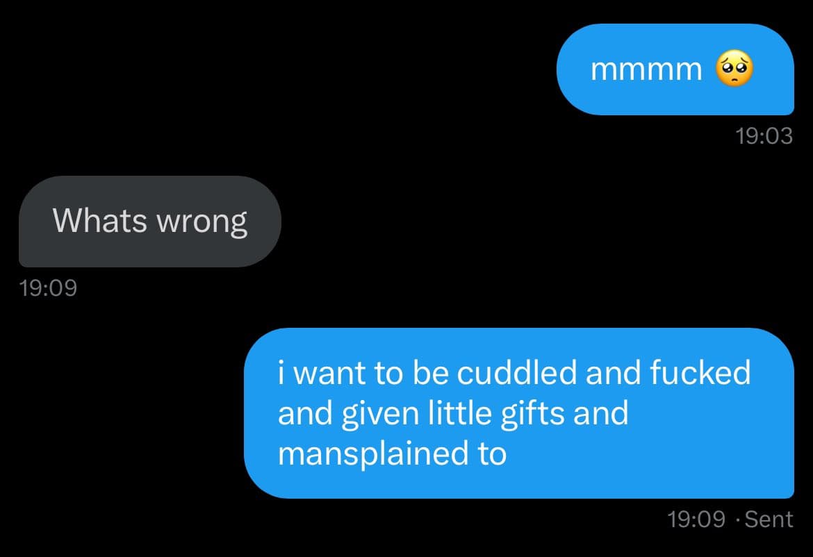 A screenshot of a text message conversation on a dark-mode phone interface. The conversation shows a user expressing a desire for affection and attention, with a reply asking what is wrong.