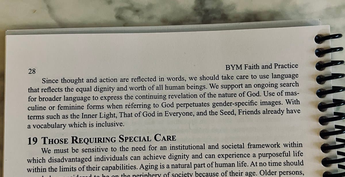 A close-up photograph of page 28 from a spiral-bound book titled "BYM Faith and Practice." The page contains a paragraph on using inclusive language for God and the beginning of a section titled "19 Those Requiring Special Care."