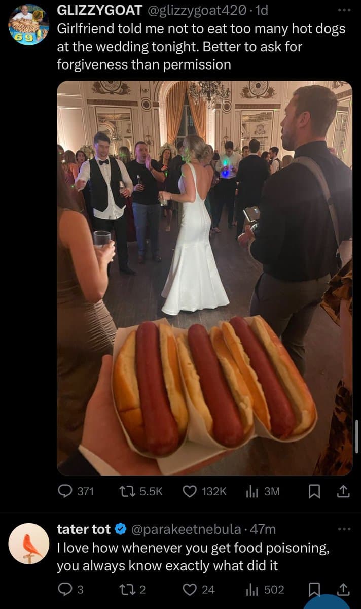 A screenshot of a Twitter thread showing a photo of a person holding a tray of four hot dogs at a wedding reception, with a bride and groom dancing in the background. The tweet is a reply to a post about eating too many hot dogs at a wedding.