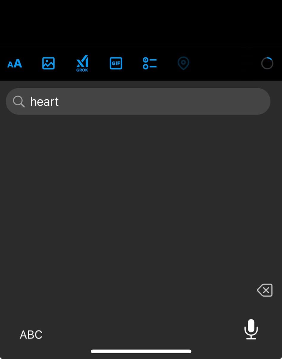 A screenshot of a mobile app's emoji picker interface, showing a search bar with the word 'heart' typed in, but the results area below is empty. The top toolbar displays icons for text formatting, images, GIFs, and other media options.