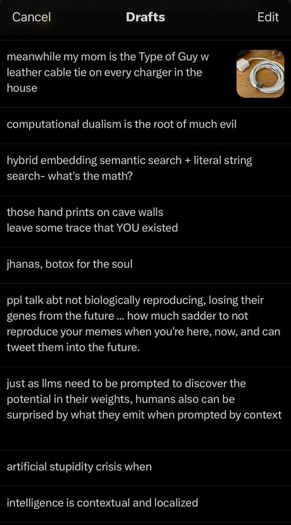 A screenshot of a mobile app's 'Drafts' screen, showing a list of saved, unfinished text posts. The interface has a dark theme with a header containing 'Cancel', 'Drafts', and 'Edit' buttons. The list includes several philosophical and technical musings, one of which is accompanied by a small thumbnail image of a coiled white cable with a leather tie.