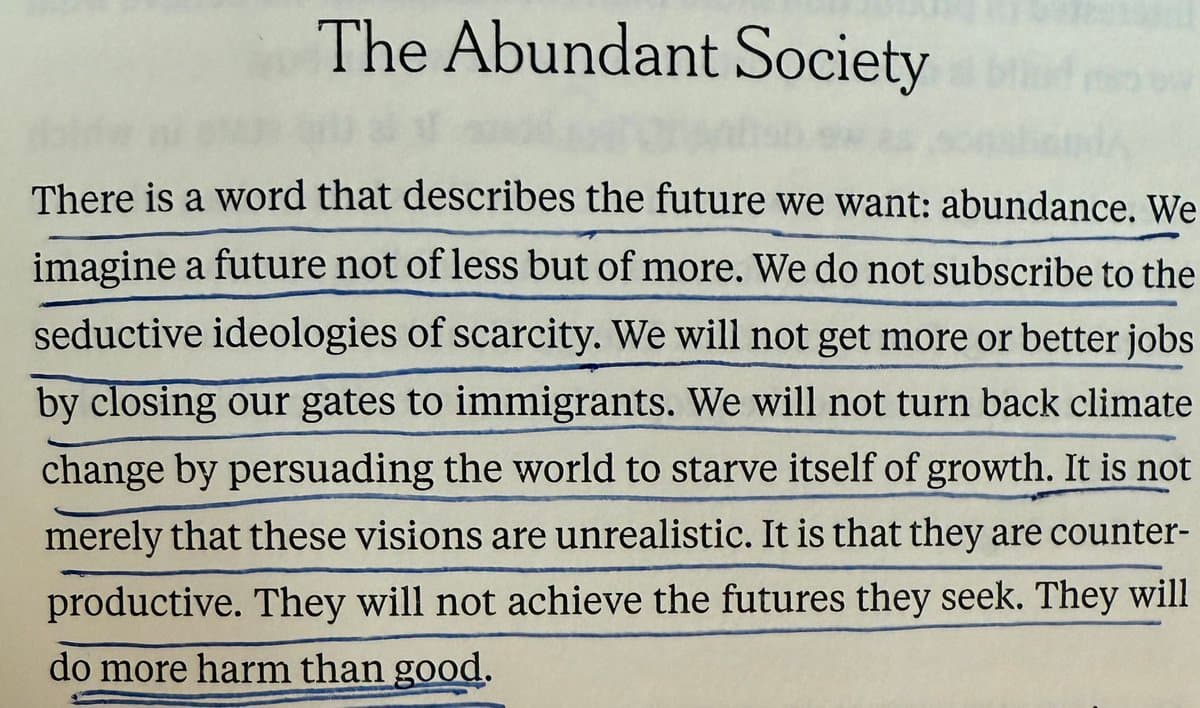 A photograph of a printed page titled "The Abundant Society," featuring a paragraph of text with several lines underlined in blue ink. The text discusses the concept of abundance versus scarcity in the context of immigration and climate change.