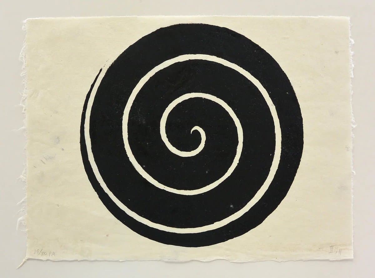 A black and white woodblock print featuring a large, bold spiral design on textured paper with deckled edges. The image is signed and numbered in the bottom corners.